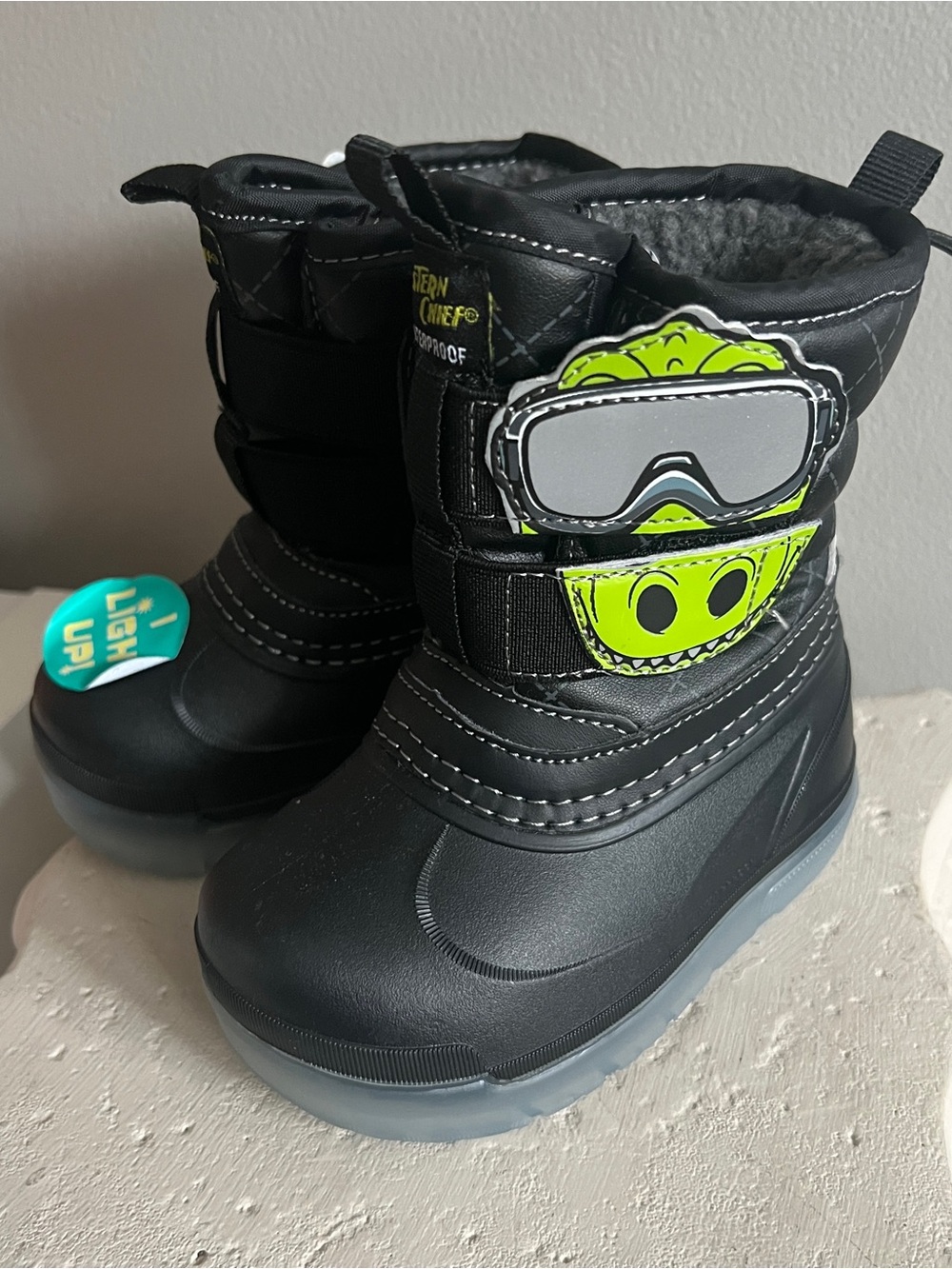 Western Chief Black Kids Snow Boots with Neon Green Dinosaur Velcro closure